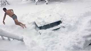 Record snowfall leads to epic slow motion snow dive