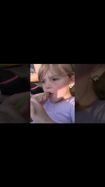 How a little girl reacts to sour candy