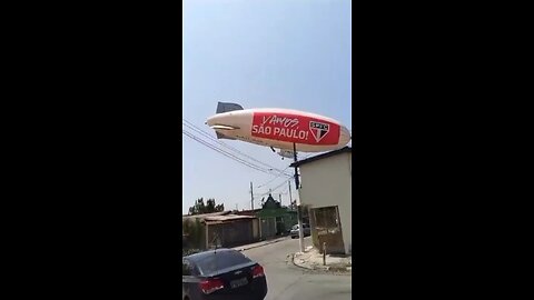 Blimp rented by a Brazilian soccer team to promote their team, crashes into houses in São Paulo