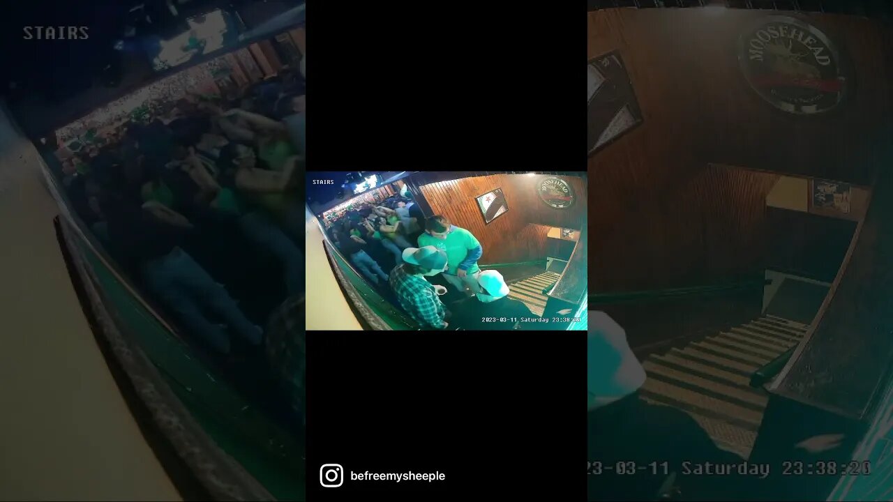 Man pushes wheelchair down flight of stairs