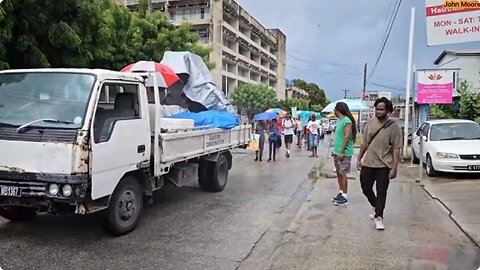 MARCH NO. 7. The faithful warriors braved the rain and flood waters to march against the injustices