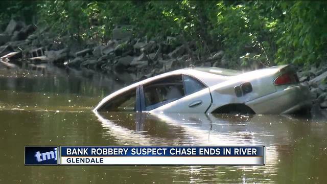 Bank robbery suspect chase ends in river