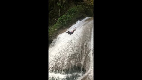 Daredevil dives off waterfall in epic slow motion