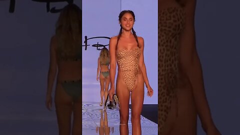 Model in animal print bikini suit by Monica Hansen Beachwear #shorts #miamiswimweek #bikinimodel