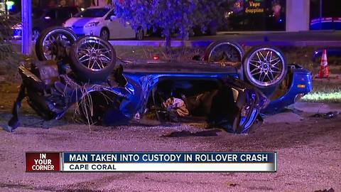 Man Taken into Custody in Rollover Crash