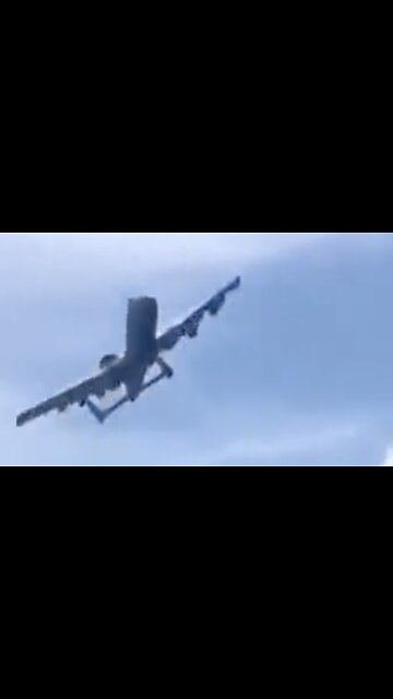 Aircraft Makes Low Pass Over Man Waving American Flag