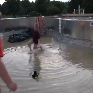 Girl Dancing In The Puddle