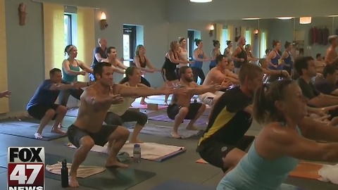 More Americans turn to yoga