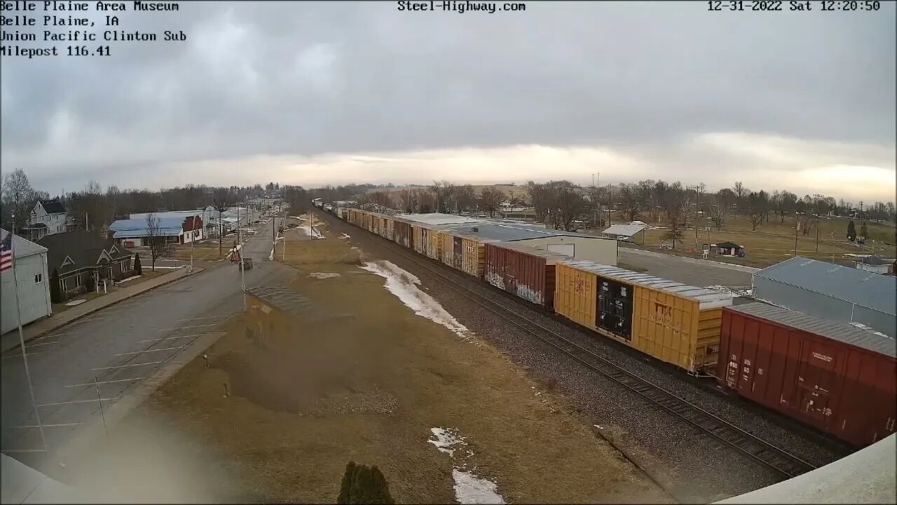 WB Manifest with NS leading and NS 1069 Mid-DPU at Belle Plaine, IA on December 31, 2022