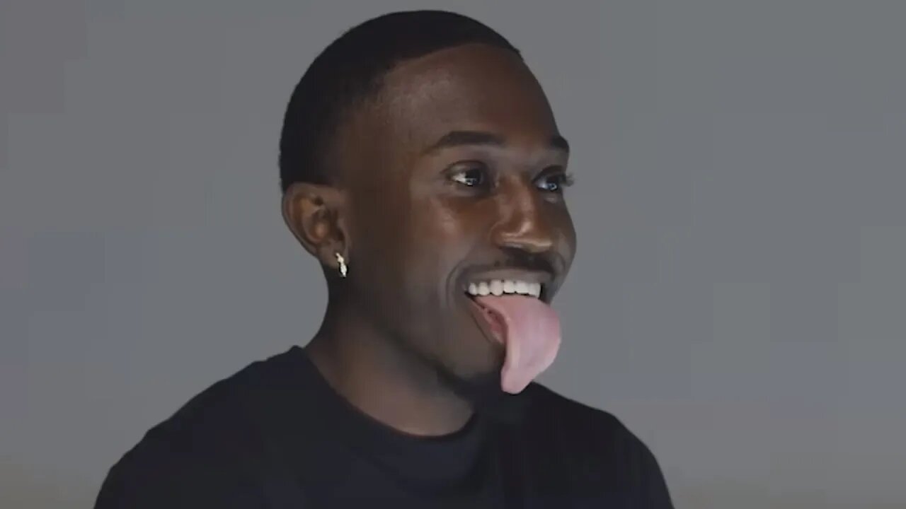 guy with massive tongue pull a baddie