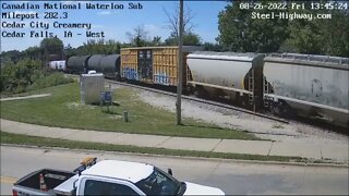 KCS 4599 Leading WB L571 Manifest at Cedar Falls, IA and at Mills Tower in Iowa Falls,IA on August 2