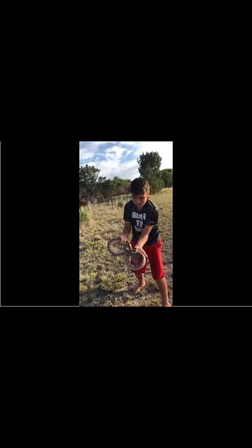 Real life Mowgli casually picks up rattlesnake
