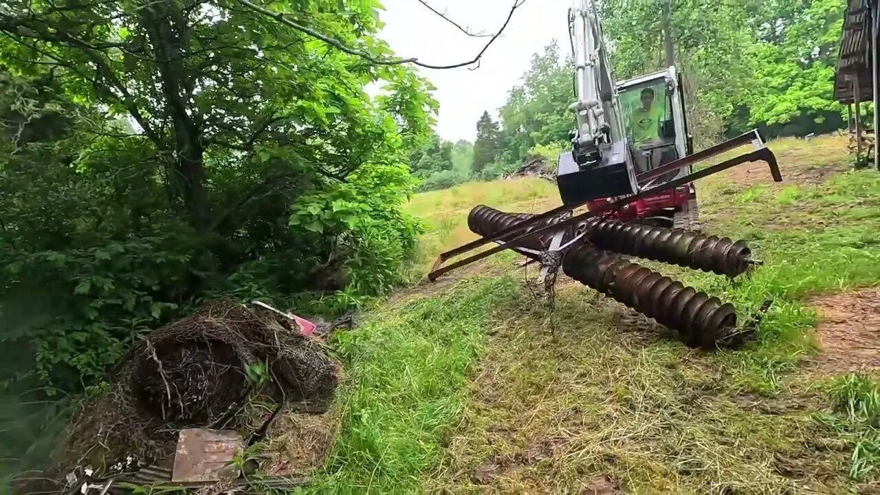 Moving a broken cultivator with a mini-ex!