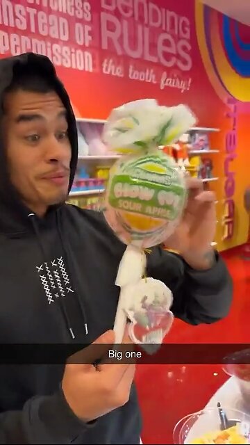 Sneako with a big lollipop