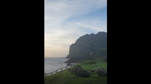 The sea of Jeju Island and Seongsan Ilchulbong.