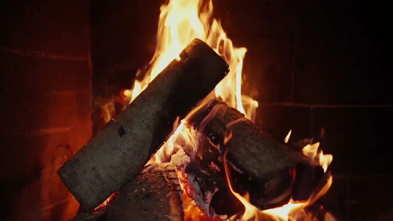 Fireplace cracks and Christmas Songs