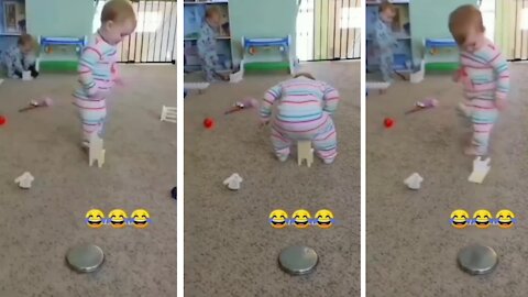 Cute baby playing with toys