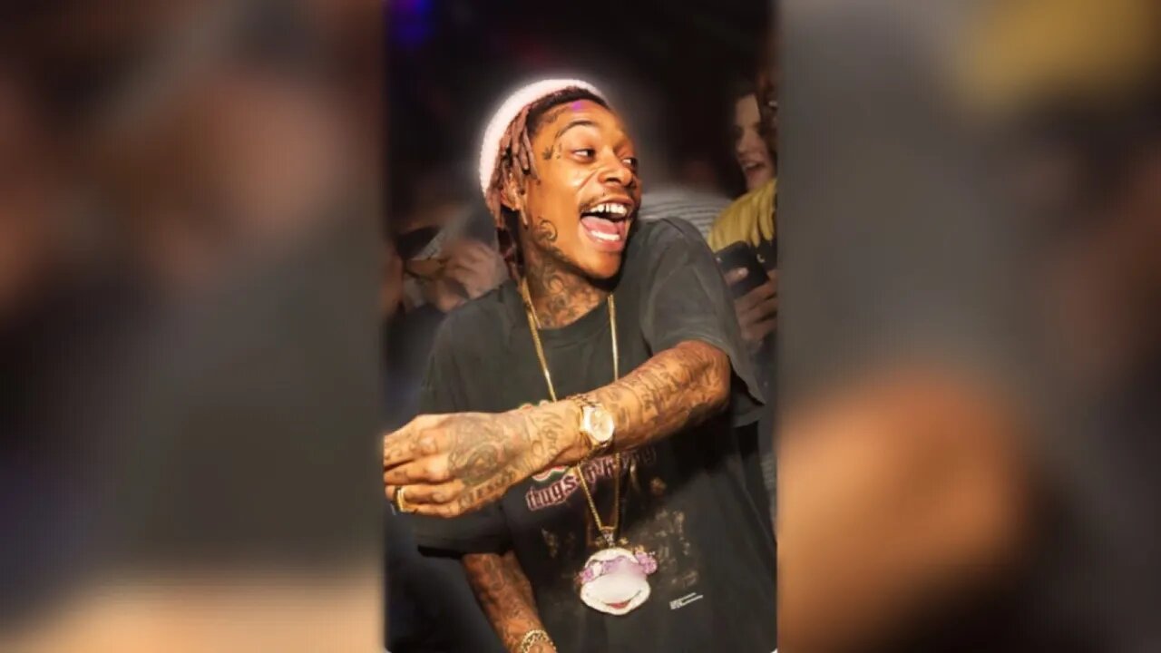 Wiz Khalifa cashes out, big time