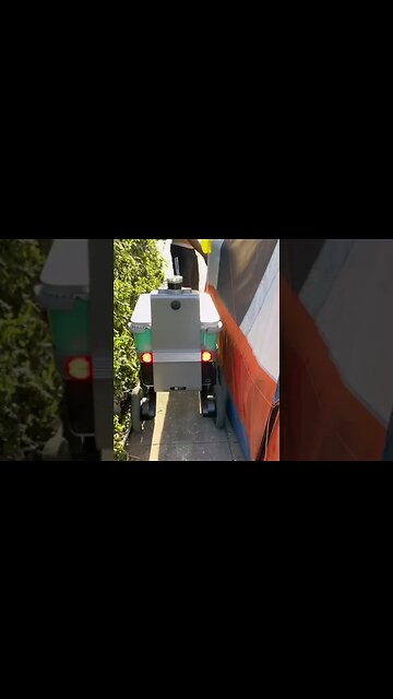 Shelby the food delivery robot having a hard time passing tents blocking the sidewalk...