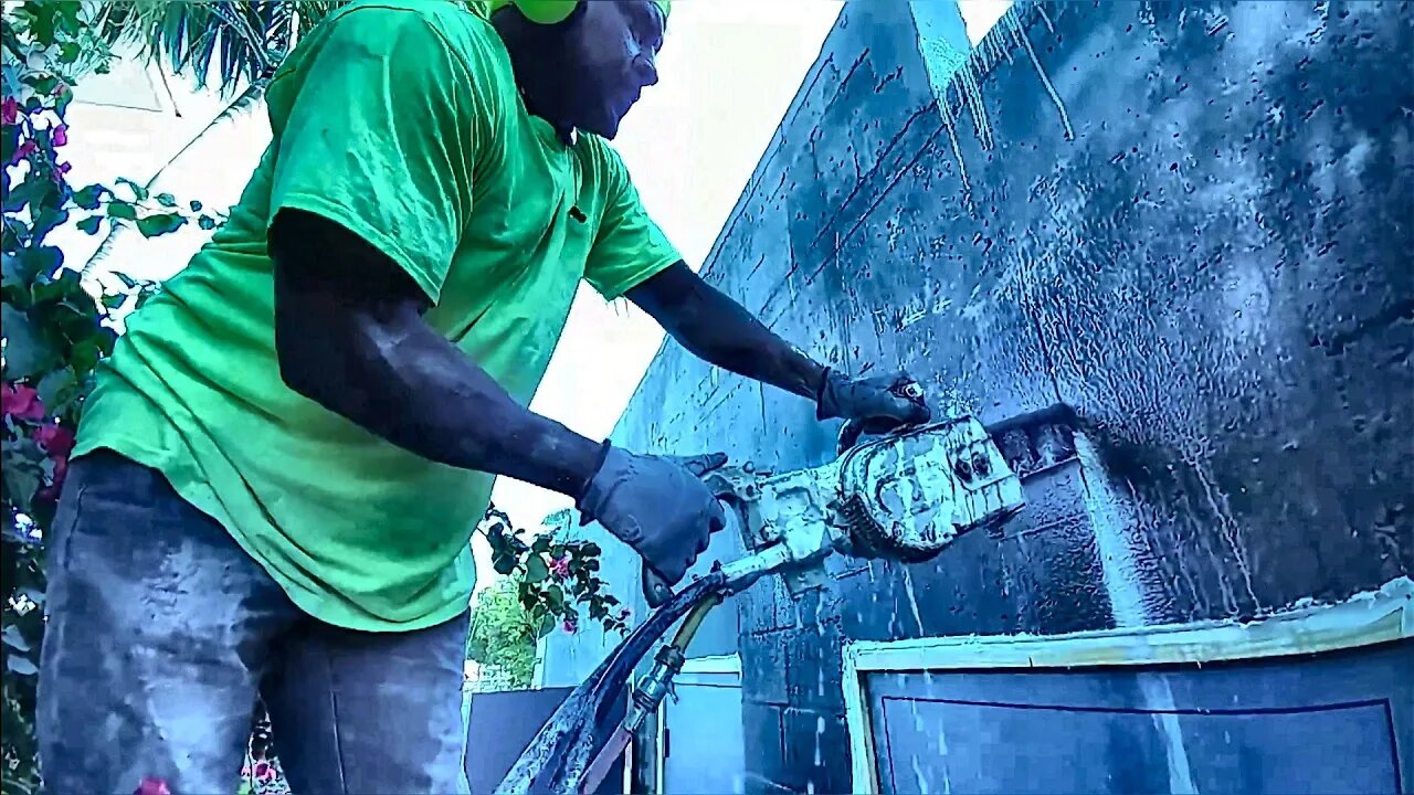 Chainsawing on a Scaffold | Concrete Cutting Miami, LLC