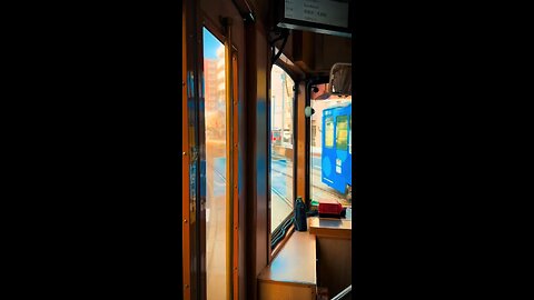 Experience the serene journey of a Kumamoto tram ride