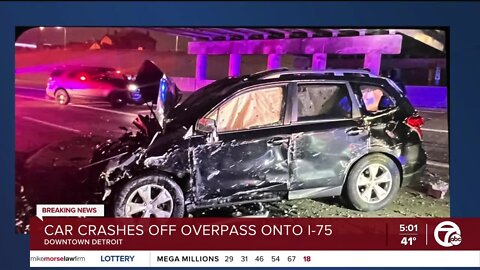 Car crashes off overpass onto I-75