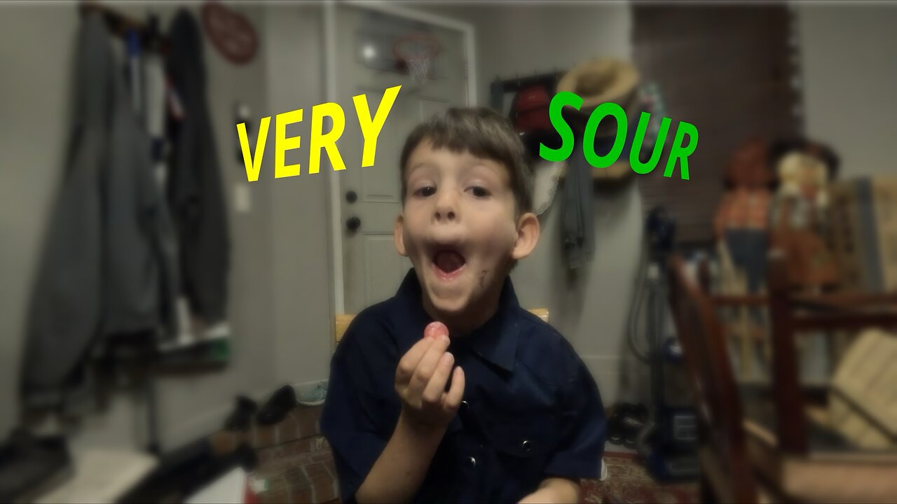 Kid tries sour candy