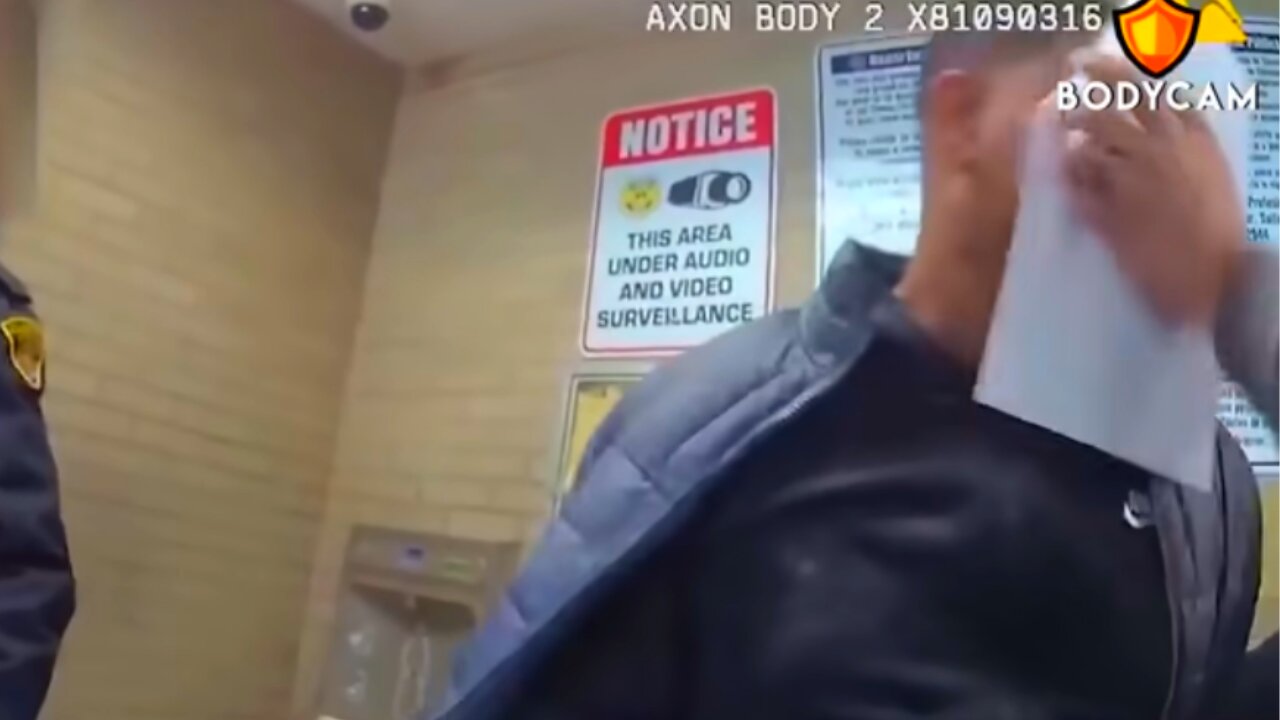 BODYCAM: Officer Shoves Warrant Into Suspect's Face