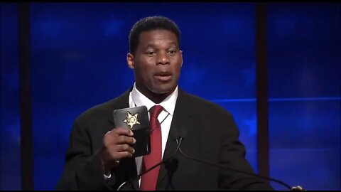 Moderator Attacks Herschel Walker For Showing A Police Badge