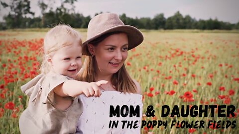 Mom & Daughter In The Poppy Flower Fields