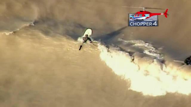 Surfers take to frigid waters of Lake Michigan