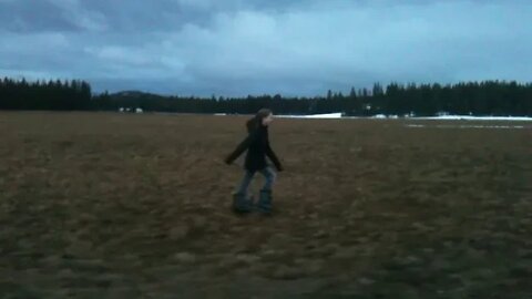 Maggie running in field