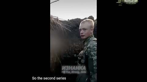 Very young Ukrainian solider is shown how to throw a grenade