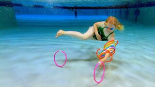 Diving for Rings and Playing Games Underwater