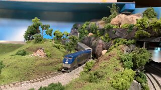 N Scale Amtrak train creeping through the scenic Glacier Pass