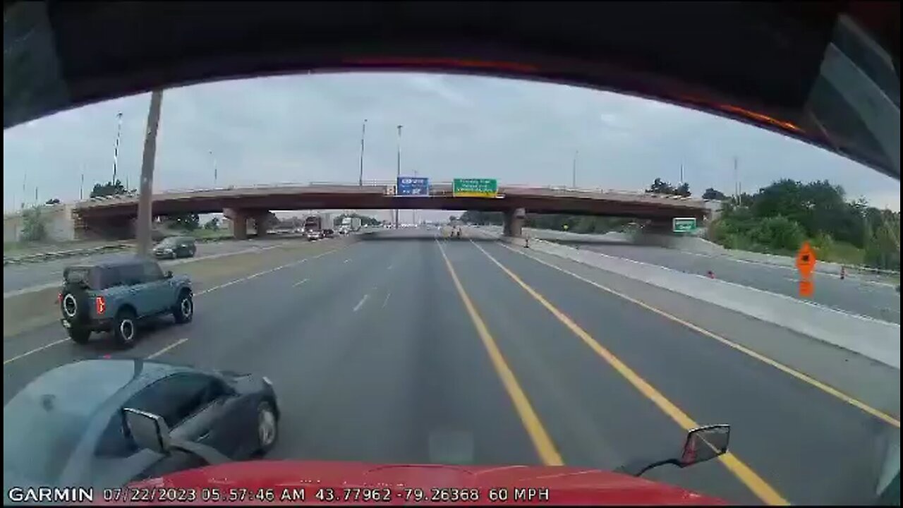 Vehicle Runs Into Construction On Highway 401