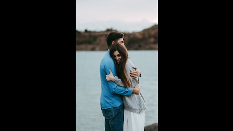 Happy Couple In The Beach