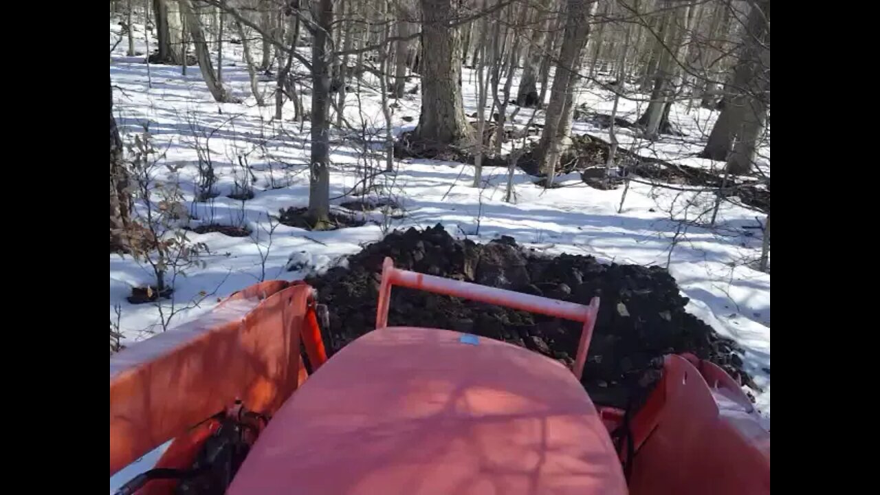Express Steel Stump Bucket digging into #3 rocks