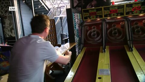 James Groh puts his skee-ball skills to the test