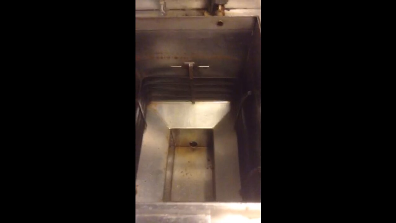 Pumping hot oil back in to the eight head fryer at my local kfc