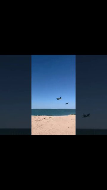 Pair Of Russian Su-25 Attack Aircraft Over The Coast Of The Sea Of Azovstal