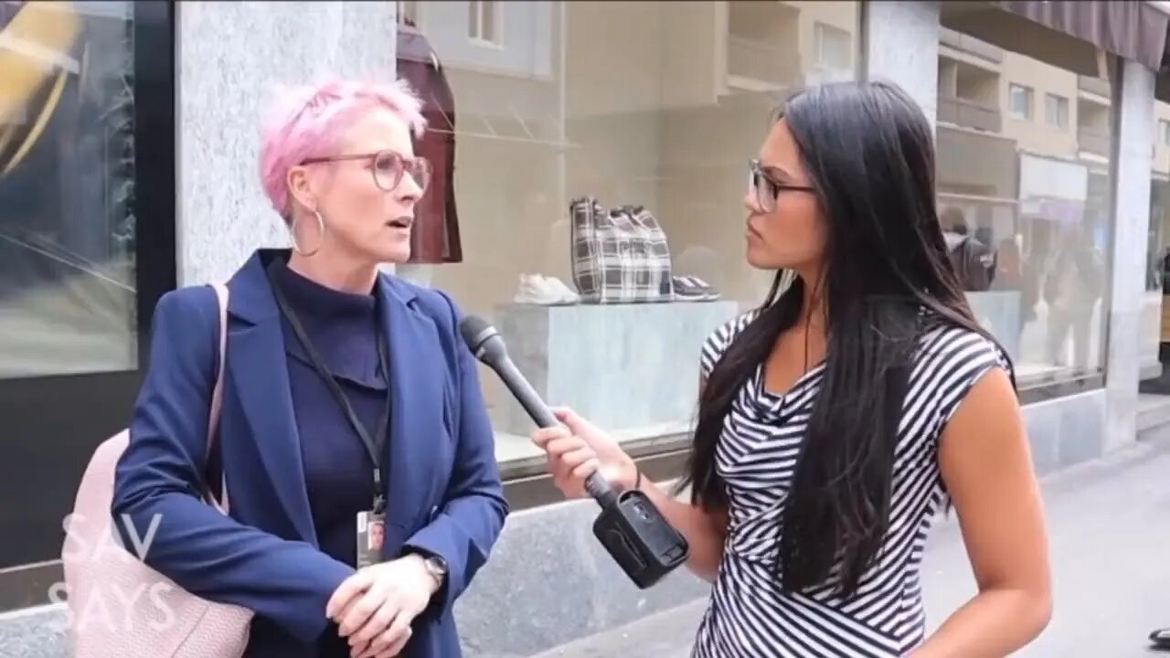 Pink-haired individual says "we will see more and more pandemics arising due to climate impacts"