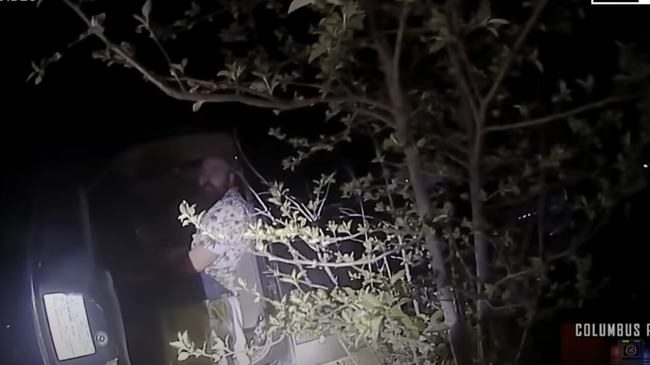 BODYCAM: Officers Find Man Crashed In A Field