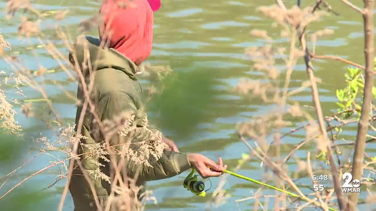 Kids connect with community police officers at BCPD fishing event