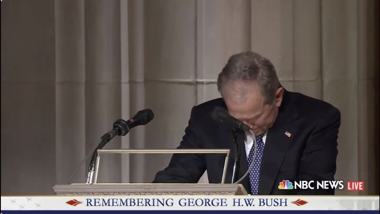 George W. Bush — Dad is hugging Robin, and holding mom's hand again