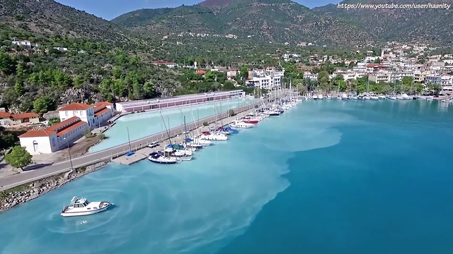 Stunning drone footage of volcano "spitting" water into sea