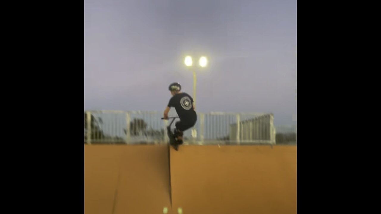 Scooter kid does crazy tricks