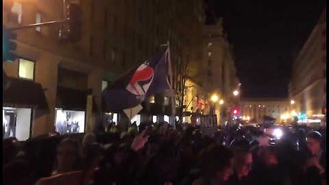 Jan 19 2017 DC 1.4 Antifa outside the deploraball, fire in the street as they chant