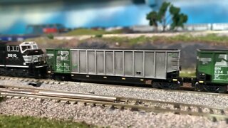 N Scale CSX/NS long hood forward empty coal train