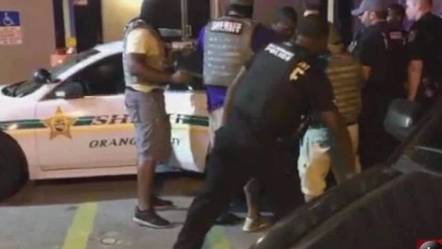Markeith Loyd being taken into custody after a weeklong manhunt